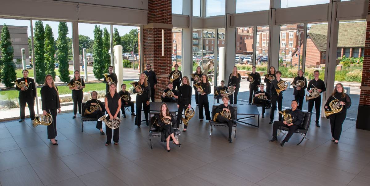 horn_studio25-26.jpg image of students posed in lobby holding French horns