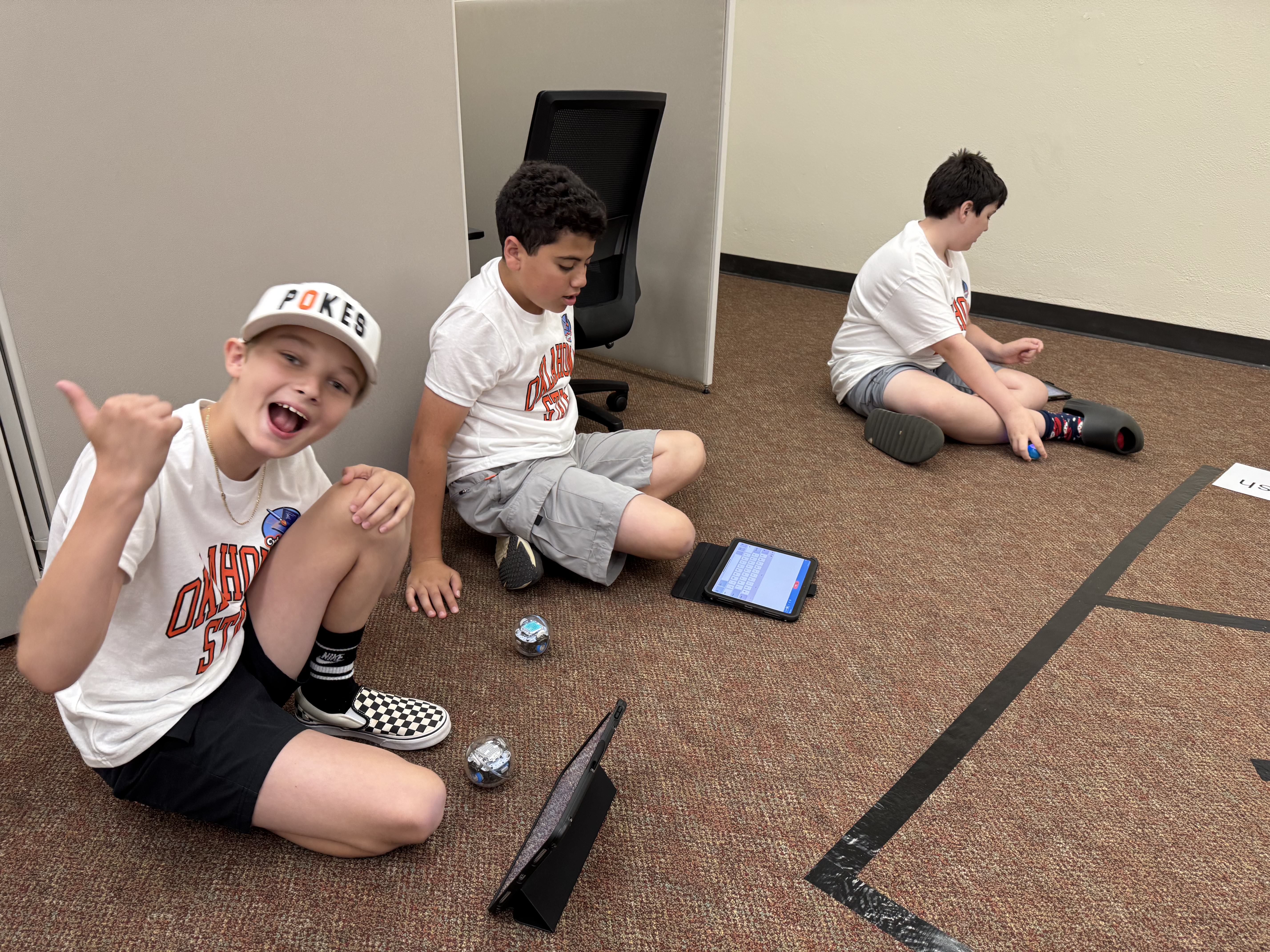 Student in a classroom actively engaged in a class activity.