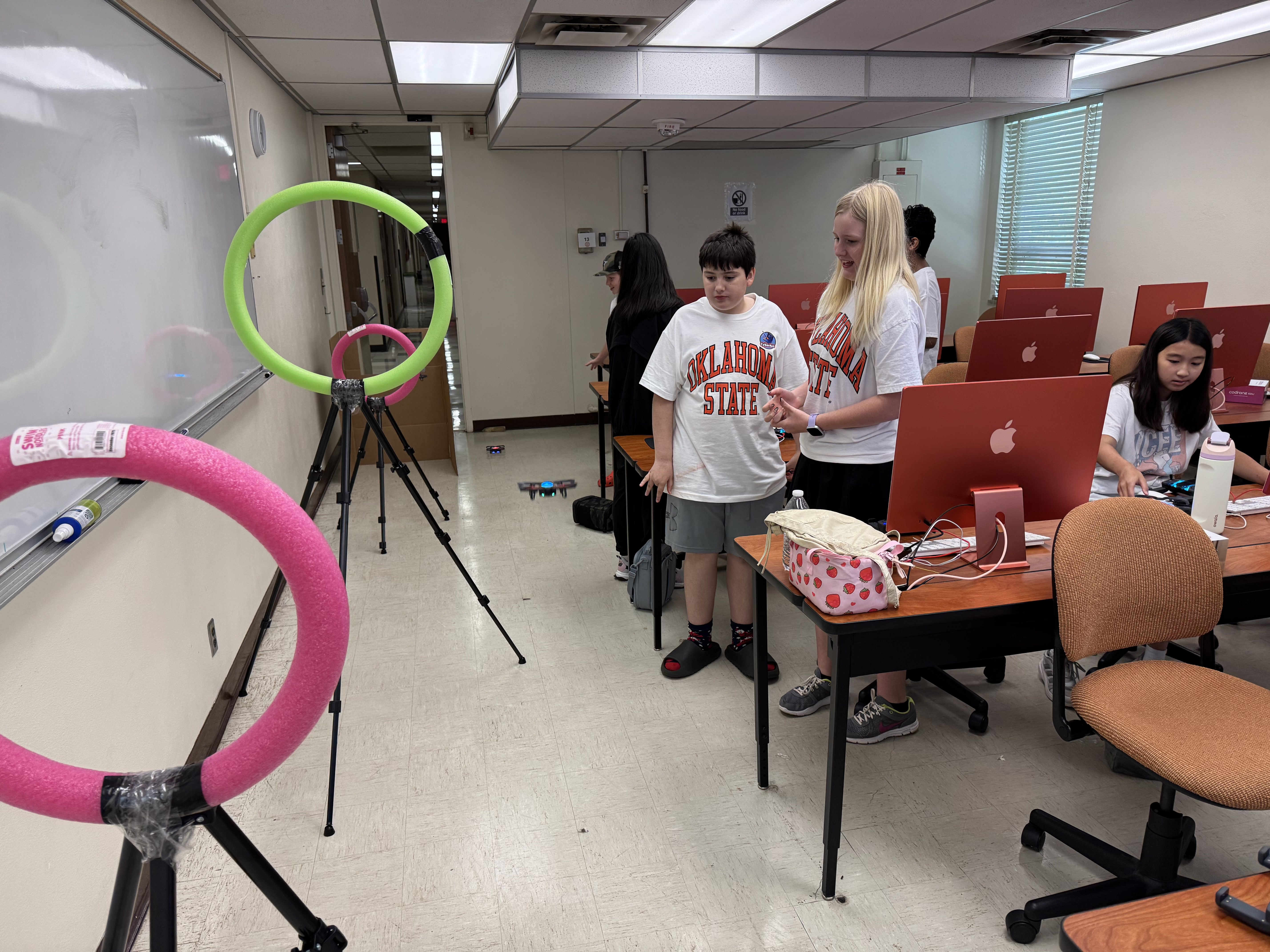 Student in a classroom actively engaged in a class activity.