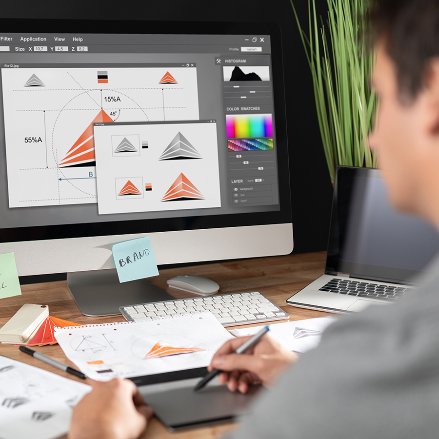 Man at a computer doing graphic design