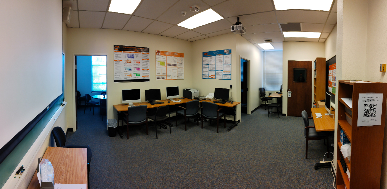A photo of a room with desks and computers