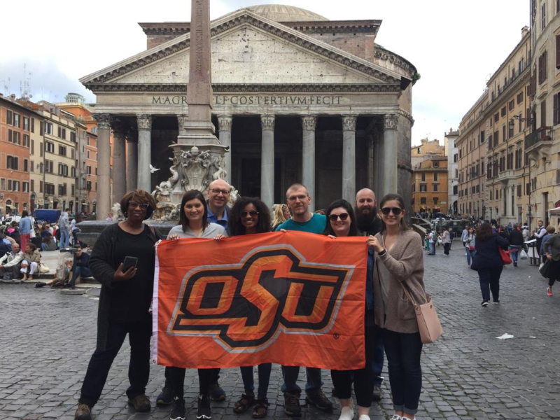Summer trip 2018 students with OSU flag