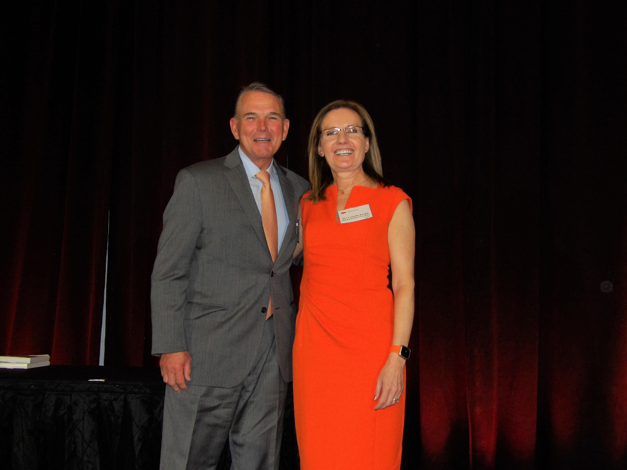 Mike Gaskins and Camelia Knapp posing together at banquet.