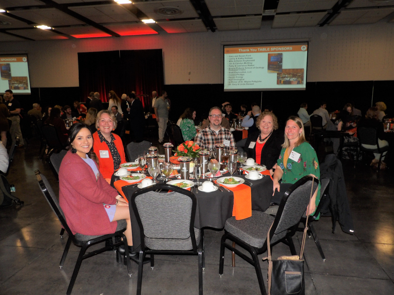Ms. Karla, Mrs. Martha, Mr. Matthew, Mrs. Sheri and Ms. Maddy all sitting together at the banquet dinner.