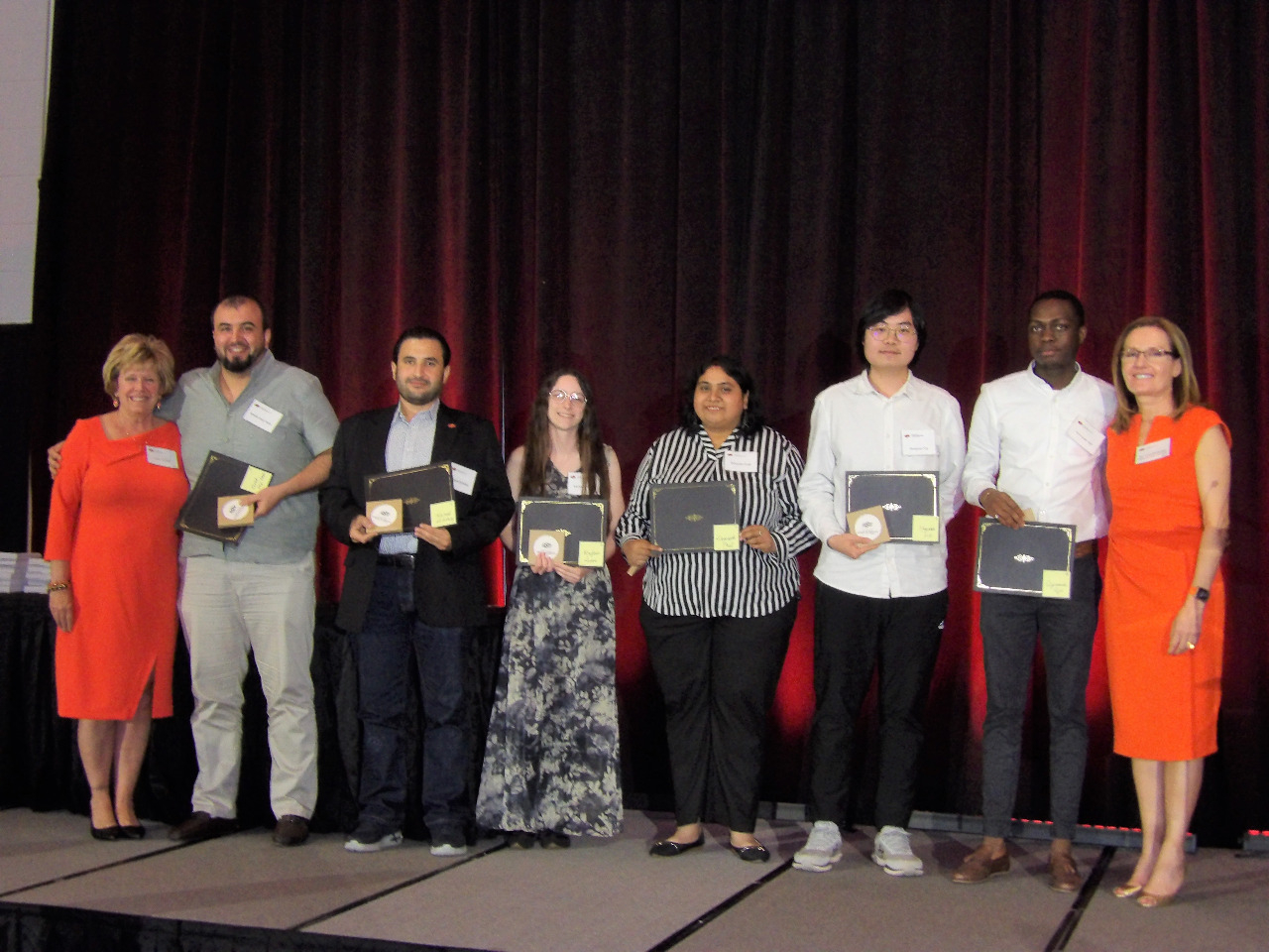 Fou male and two femal scholarship recipients with Mrs. Patty Waker and Dr. Camelia Knapp.