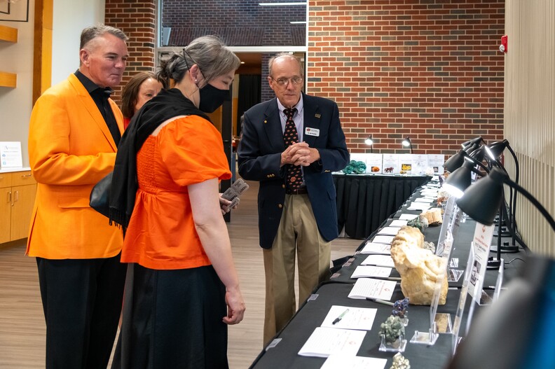 Mike and Sue Gaskins, Tracy Quan and JIm Puckette checking out the silent auction.