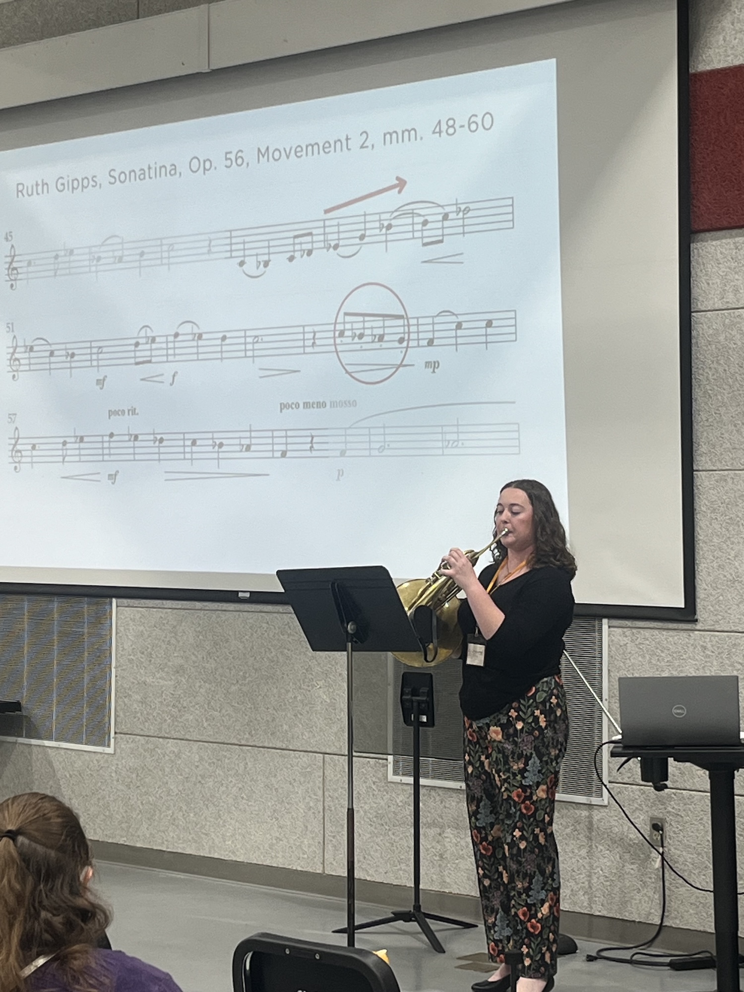 katelynn_biggs.jpg Student playing instrument for an audience