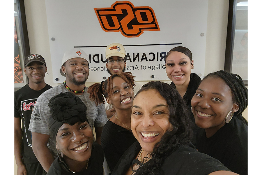 Students posing in front of Africana Studies