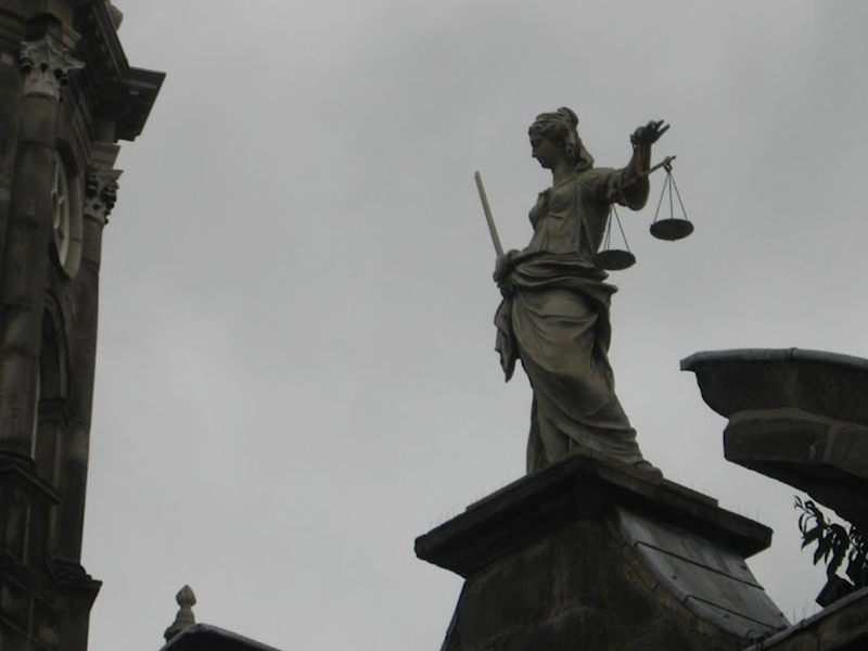 Photo of blind justice statue in Dublin, Ireland