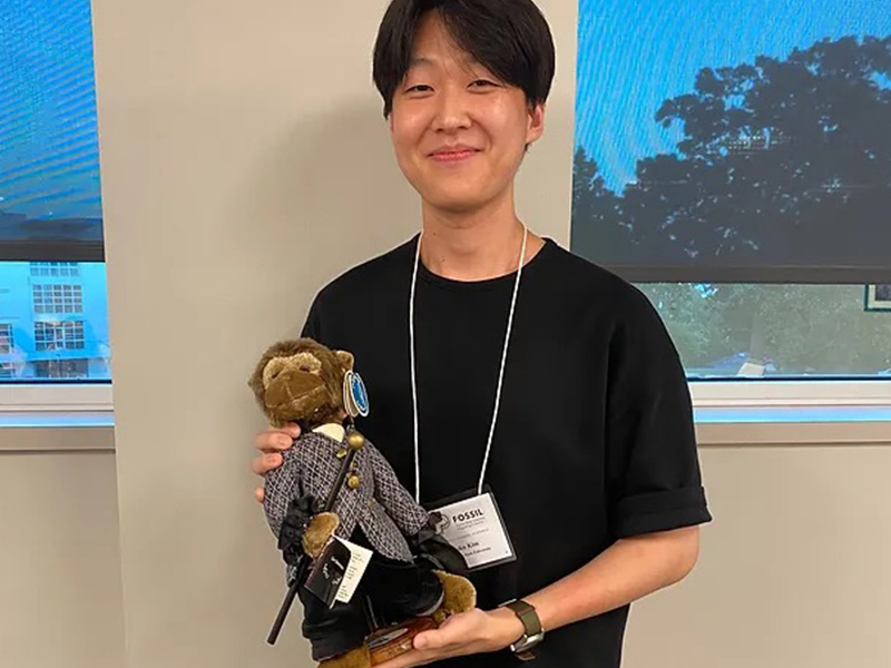 John Kim with award